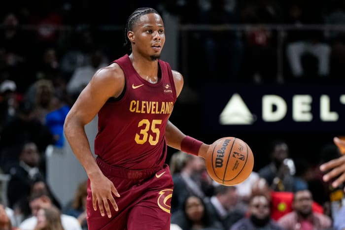 Oct 10, 2023; Atlanta, Georgia, USA; Cleveland Cavaliers forward Isaac Okoro (35) brings the ball up the court against the Atlanta Hawks during the second half at State Farm Arena.